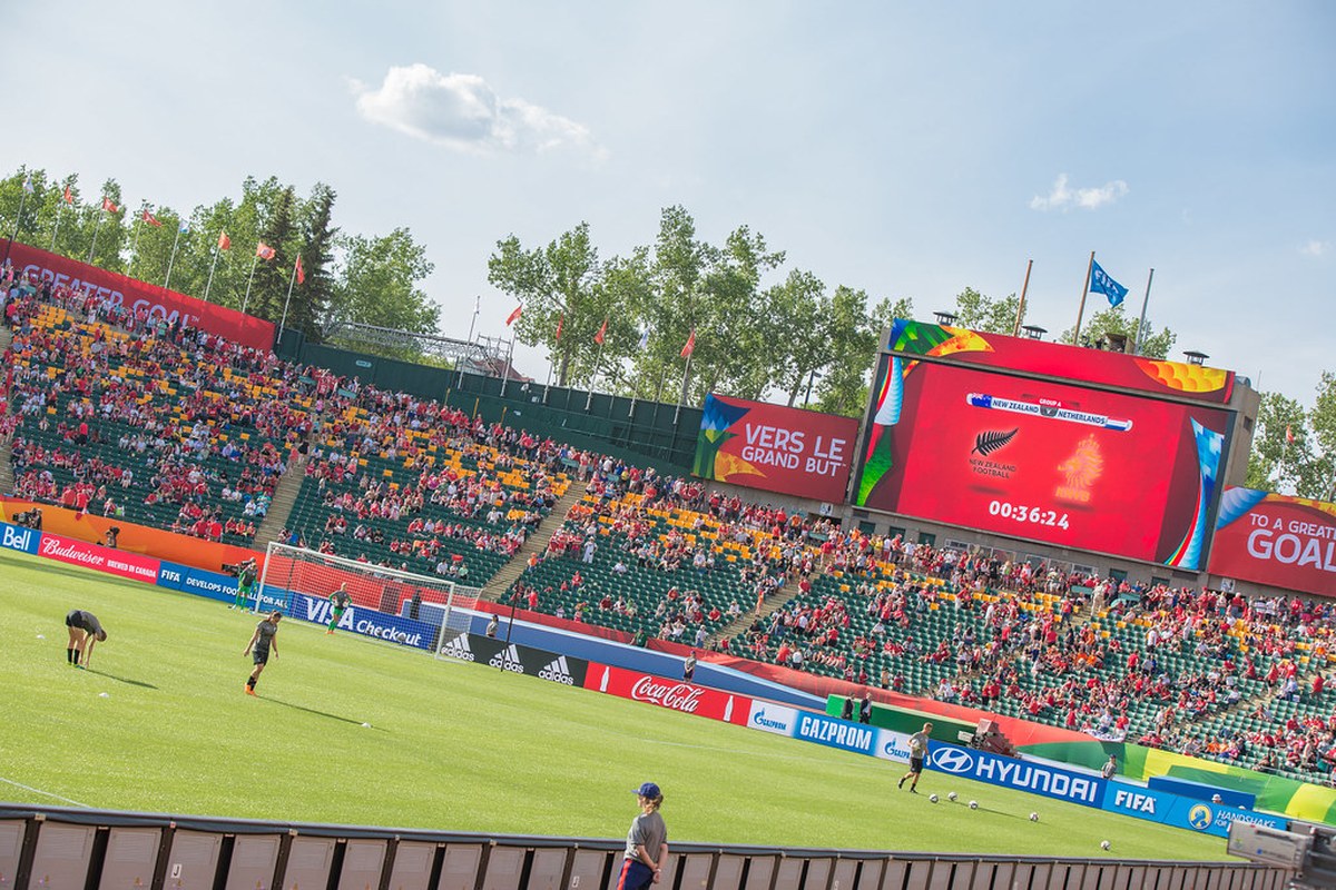 Players warming up before a 2015 FIFA Women's World Cup match in Edmonton; historical tournament context, not Brazil 2027