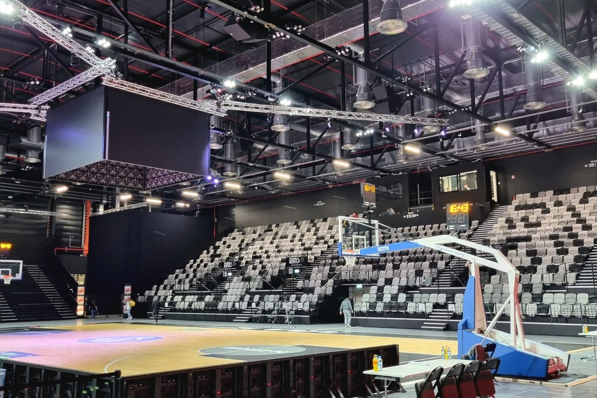 The interior of an empty basketball arena before the game.